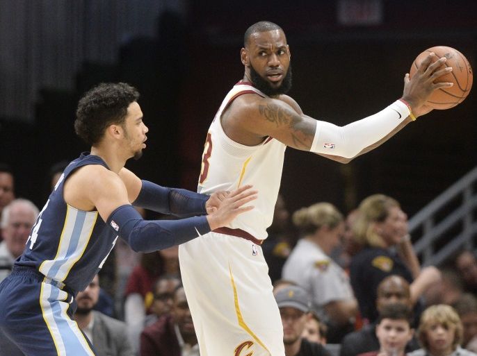 Dec 2, 2017; Cleveland, OH, USA; Memphis Grizzlies forward Dillon Brooks (24) defends Cleveland Cavaliers forward LeBron James (23) during the first quarter at Quicken Loans Arena. Mandatory Credit: Ken Blaze-USA TODAY Sports