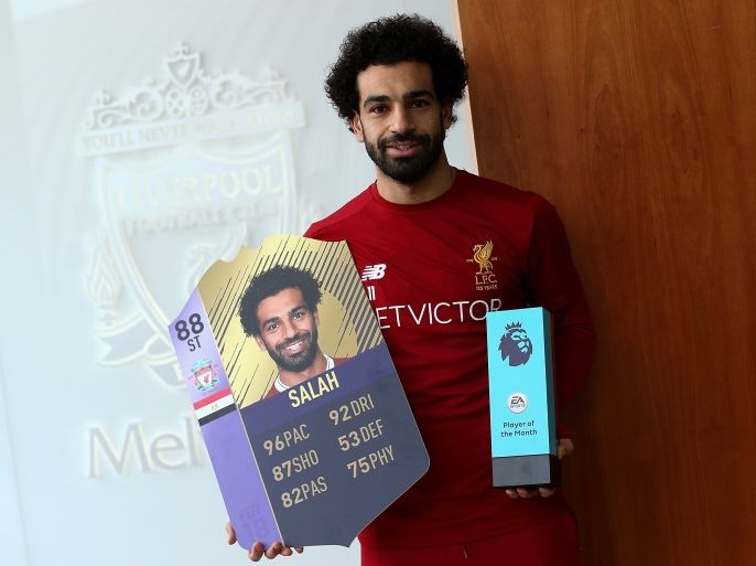 LIVERPOOL, ENGLAND - DECEMBER 14: Mohamed Salah is Awarded the EA SPORTS Player of the Month for November at Melwood Training Ground on December 14, 2017 in Liverpool, England. (Photo by Jan Kruger/Getty Images for Premier League)