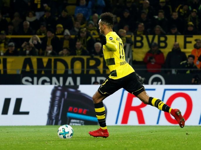 Soccer Football - Bundesliga - Borussia Dortmund vs TSG 1899 Hoffenheim - Signal Iduna Park, Dortmund, Germany - December 16, 2017 Borussia Dortmund’s Pierre-Emerick Aubameyang scores their first goal from the penalty spot REUTERS/Leon Kuegeler DFL RULES TO LIMIT THE ONLINE USAGE DURING MATCH TIME TO 15 PICTURES PER GAME. IMAGE SEQUENCES TO SIMULATE VIDEO IS NOT ALLOWED AT ANY TIME. FOR FURTHER QUERIES PLEASE CONTACT DFL DIRECTLY AT + 49 69 650050