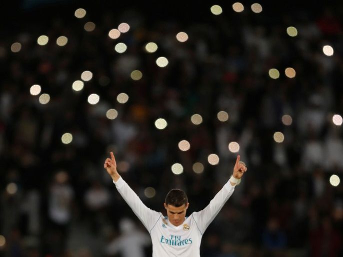 Soccer Football - FIFA Club World Cup Final - Real Madrid vs Gremio FBPA - Zayed Sports City Stadium, Abu Dhabi, United Arab Emirates - December 16, 2017 Real Madrid’s Cristiano Ronaldo celebrates winning the FIFA Club World Cup REUTERS/Amr Abdallah Dalsh TPX IMAGES OF THE DAY