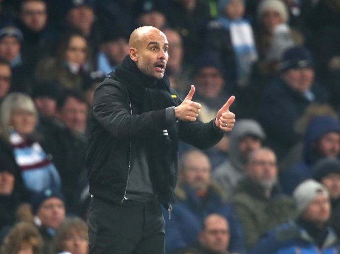MANCHESTER, ENGLAND - DECEMBER 16: Josep Guardiola, Manager of Manchester City gives his team instructions during the Premier League match between Manchester City and Tottenham Hotspur at Etihad Stadium on December 16, 2017 in Manchester, England. (Photo by Clive Brunskill/Getty Images)