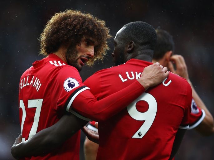 MANCHESTER, ENGLAND - SEPTEMBER 30: Romelu Lukaku (R) of Manchester United celebrates scoring his side's fourth goal with his team mate Marouane Fellaini (L) during the Premier League match between Manchester United and Crystal Palace at Old Trafford on September 30, 2017 in Manchester, England. (Photo by Clive Brunskill/Getty Images)