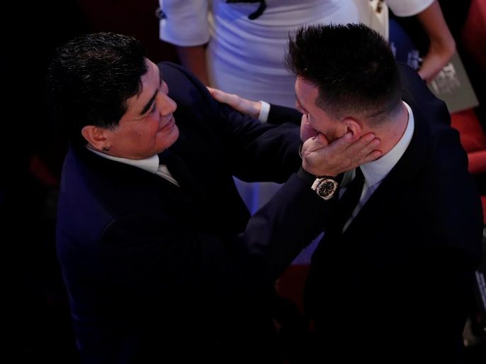 Soccer Football - The Best FIFA Football Awards - London Palladium, London, Britain - October 23, 2017 Barcelona’s Lionel Messi speaks with former Argentina player Diego Maradona before the start of the awards Action Images via Reuters/John Sibley