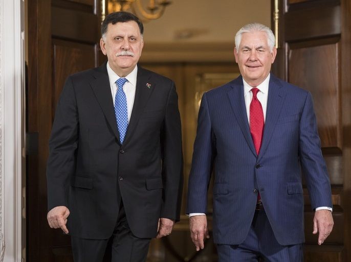 epa06361772 Embattled US Secretary of State Rex Tillerson (R) meets with Libyan Prime Minister Fayez al-Sarraj (L), at the Department of State in Washington DC, USA, 01 December 2017. Multiple news outlets have confirmed that President Trump will soon replace Secretary Tillerson with CIA Director Mike Pompeo. Tillerson called the reports of his impending dismissal 'laughable.' EPA-EFE/JIM LO SCALZO