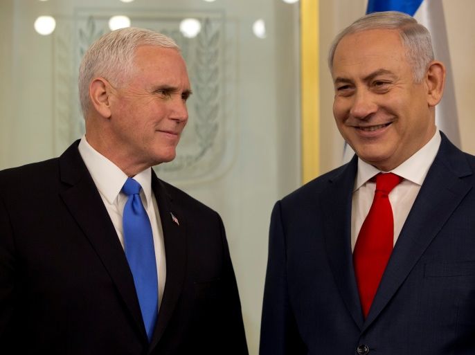 U.S. Vice President Mike Pence stands next to Israeli Prime Minister Benjamin Netanyahu during a meeting at the Prime Minister's office in Jerusalem January 22, 2018. REUTERS/Ariel Schalit/Pool