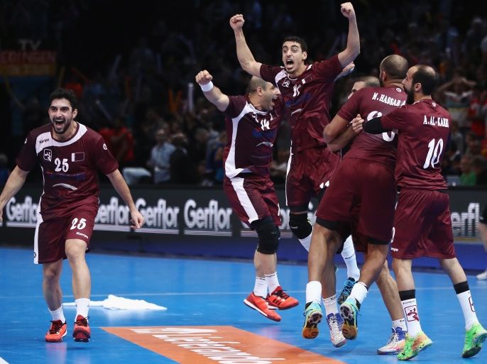 PARIS, FRANCE - JANUARY 22: Players of Qatar celebrate after the 25th IHF Men's World Championship 2017 Round of 16 match between Germany and Qatar at Accorhotels Arena on January 22, 2017 in Paris, France. (Photo by Alex Grimm/Bongarts/Getty Images)