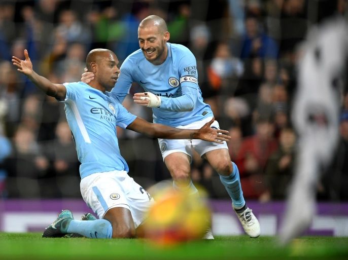 MANCHESTER, ENGLAND - JANUARY 31: Fernandinho of Manchester City celebrates after scoring his sides first goal with David Silva of Manchester City during the Premier League match between Manchester City and West Bromwich Albion at Etihad Stadium on January 31, 2018 in Manchester, England. (Photo by Laurence Griffiths/Getty Images)