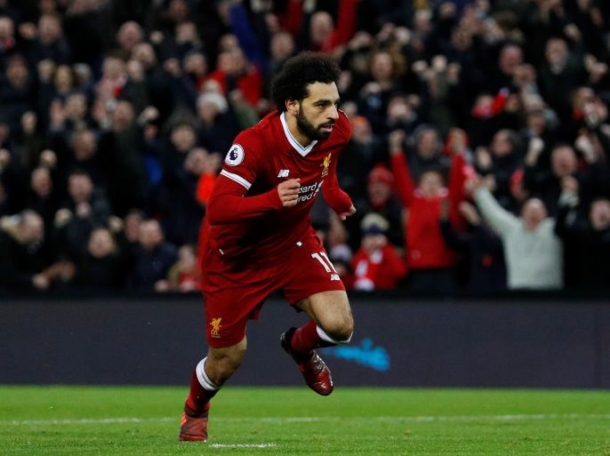 Soccer Football - Premier League - Liverpool vs Leicester City - Anfield, Liverpool, Britain - December 30, 2017 Liverpool's Mohamed Salah celebrates scoring their first goal REUTERS/Phil Noble EDITORIAL USE ONLY. No use with unauthorized audio, video, data, fixture lists, club/league logos or