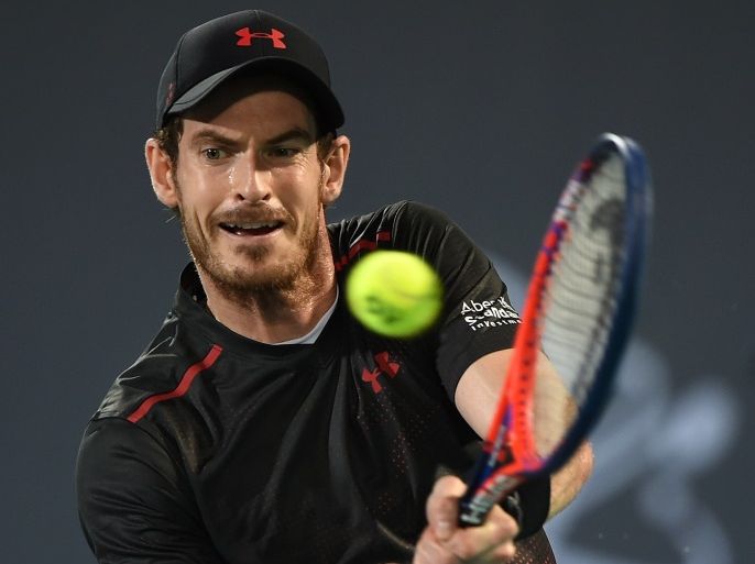 ABU DHABI, UNITED ARAB EMIRATES - DECEMBER 29: Andy Murray of Great Britain plays a backhand during his exhibition match against Roberto Bautista Agut of Spain on day two of the Mubadala World Tennis Championship at International Tennis Centre Zayed Sports City on December 29, 2017 in Abu Dhabi, United Arab Emirates. (Photo by Tom Dulat/Getty Images)