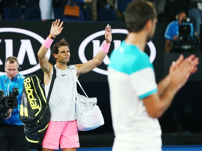 MELBOURNE, AUSTRALIA - JANUARY 23: Rafael Nadal of Spain waves to the crowd after he pulled out in the fifth set due to an injury in his quarter-final match against Marin Cilic of Croatia on day nine of the 2018 Australian Open at Melbourne Park on January 23, 2018 in Melbourne, Australia. (Photo by Michael Dodge/Getty Images)
