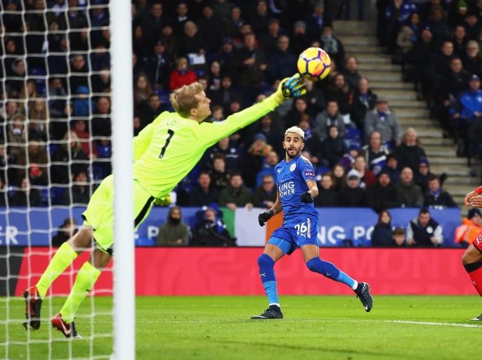 LEICESTER, ENGLAND - JANUARY 01: Riyad Mahrez of Leicester City scores the opening goal during the Premier League match between Leicester City and Huddersfield Town at The King Power Stadium on January 1, 2018 in Leicester, England. (Photo by Clive Mason/Getty Images)
