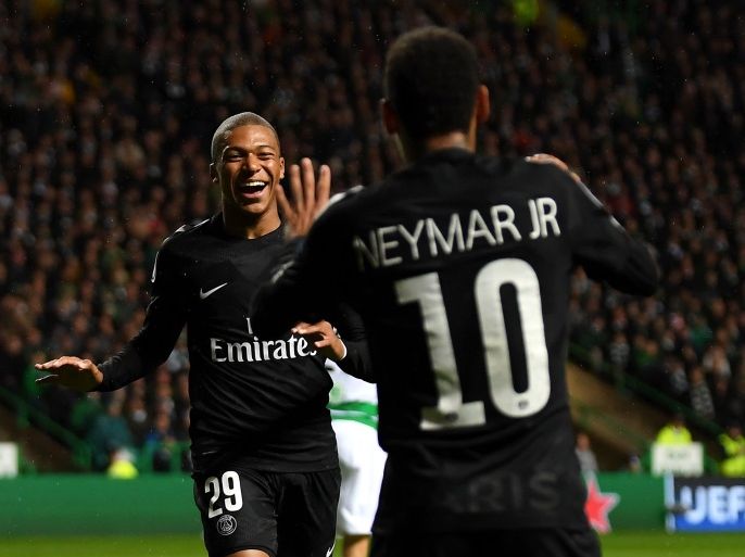 GLASGOW, SCOTLAND - SEPTEMBER 12: Kylian Mbappe of PSG celebrates scoring his sides second goal with Neymar of PSG during the UEFA Champions League Group B match between Celtic and Paris Saint Germain at Celtic Park on September 12, 2017 in Glasgow, Scotland. (Photo by Mike Hewitt/Getty Images)