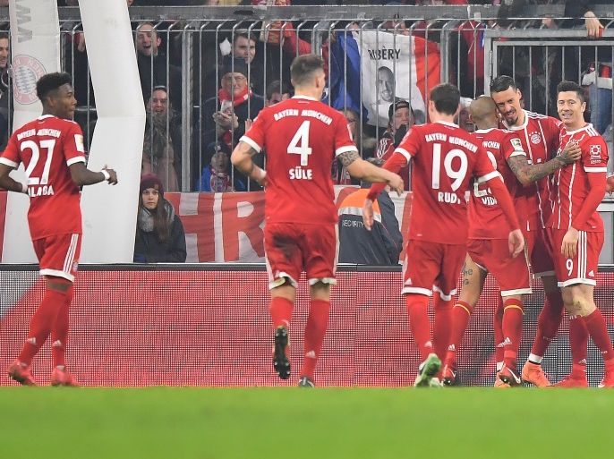 MUNICH, GERMANY - JANUARY 27: Sandro Wagner of Muenchen (2nd right) celebrates with his team after he scored a goal to make it 5:2 during the Bundesliga match between FC Bayern Muenchen and TSG 1899 Hoffenheim at Allianz Arena on January 27, 2018 in Munich, Germany. (Photo by Sebastian Widmann/Bongarts/Getty Images)