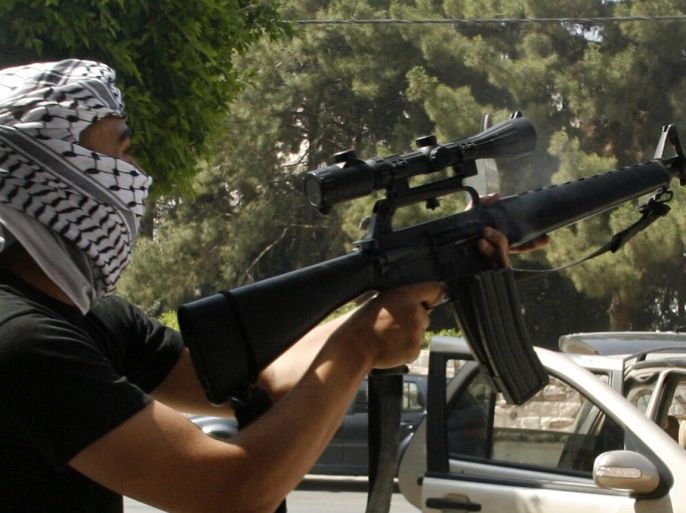 blogs فلسطيني يحمل بندقية