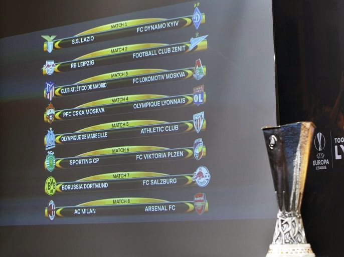 pa06557567 The match fixtures are displayed on an electronic panel next to the Europa League trophy following the draw of the UEFA Europa League 2017-18 round of 16 soccer matches at the UEFA Headquarters in Nyon, Switzerland, 23 February 2018. EPA-EFE/SALVATORE DI NOLF