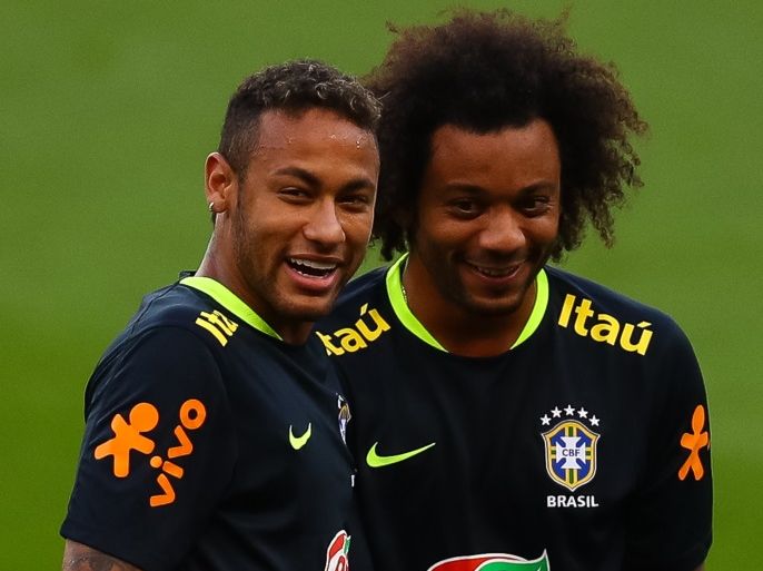 PORTO ALEGRE, BRAZIL - AUGUST 29: Neymar (L) and Marcelo take part in a training session at the Beira Rio Stadium on August 29, 2017 in Porto Alegre, Brazil, ahead of their 2018 FIFA World Cup qualifier match against Ecuador on August 31. (Photo by Buda Mendes/Getty Images)