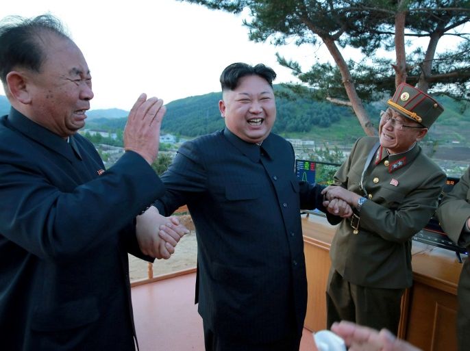 FILE PHOTO: North Korean leader Kim Jong Un reacts with Ri Pyong Chol (L) in this undated photo released by North Korea's Korean Central News Agency (KCNA) on May 15, 2017. To match Insight NORTHKOREA-KIMJONGUN/ KCNA/via REUTERS/File Photo ATTENTION EDITORS - THIS PICTURE WAS PROVIDED BY A THIRD PARTY. REUTERS IS UNABLE TO INDEPENDENTLY VERIFY THE AUTHENTICITY, CONTENT, LOCATION OR DATE OF THIS IMAGE. NO THIRD PARTY SALES. SOUTH KOREA OUT.
