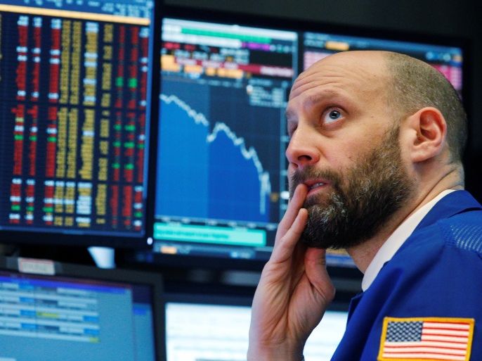 A trader reacts as he watches screens on the floor of the New York Stock Exchange in New York, U.S., February 5, 2018. REUTERS/Brendan McDermid