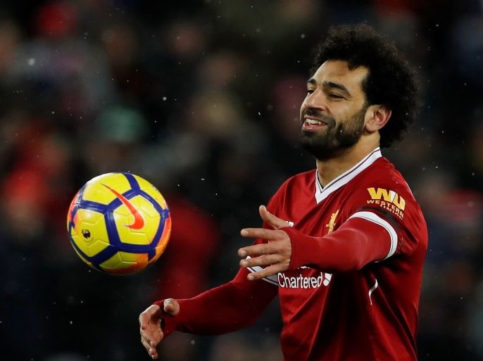 Soccer Football - Premier League - Liverpool vs Watford - Anfield, Liverpool, Britain - March 17, 2018 Liverpool's Mohamed Salah celebrates with the match ball after the match Action Images via Reuters/Lee Smith EDITORIAL USE ONLY. No use with unauthorized audio, video, data, fixture lists, club/league logos or