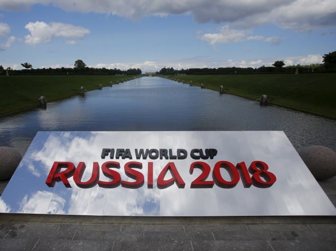 The 2018 World Cup logo is pictured near the Konstantin (Konstantinovsky) Palace, the venue of the preliminary draw for the 2018 World Cup, in St. Petersburg, July 24, 2015. The 2018 World Cup's preliminary draw will be held in St. Petersburg on July 25. REUTERS/Maxim Shemetov