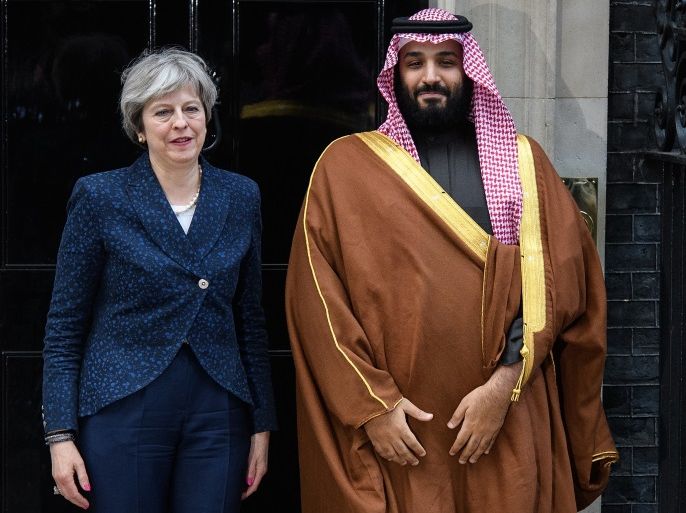 LONDON, ENGLAND - MARCH 07: British Prime Minister Theresa May (L) stands with Saudi Crown Prince Mohammed bin Salman on the steps of number 10 Downing Street on March 7, 2018 in London, England. Saudi Crown Prince Mohammed bin Salman has made wide-ranging changes at home supporting a more liberal Islam. Whilst visiting the UK he will meet with several members of the Royal family and the Prime Minister. (Photo by Leon Neal/Getty Images)