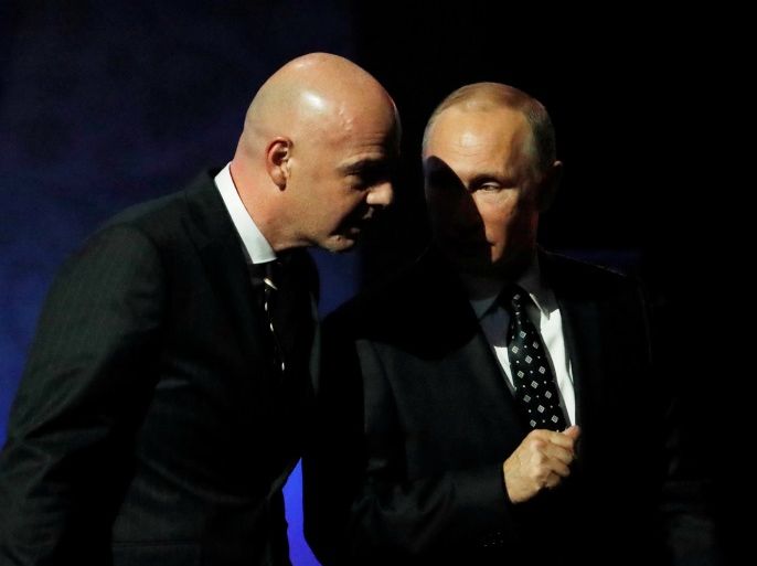 Soccer Football - 2018 FIFA World Cup Draw - State Kremlin Palace, Moscow, Russia - December 1, 2017 President of Russia Vladimir Putin and FIFA President Gianni Infantino during the draw REUTERS/Grigory Dukor