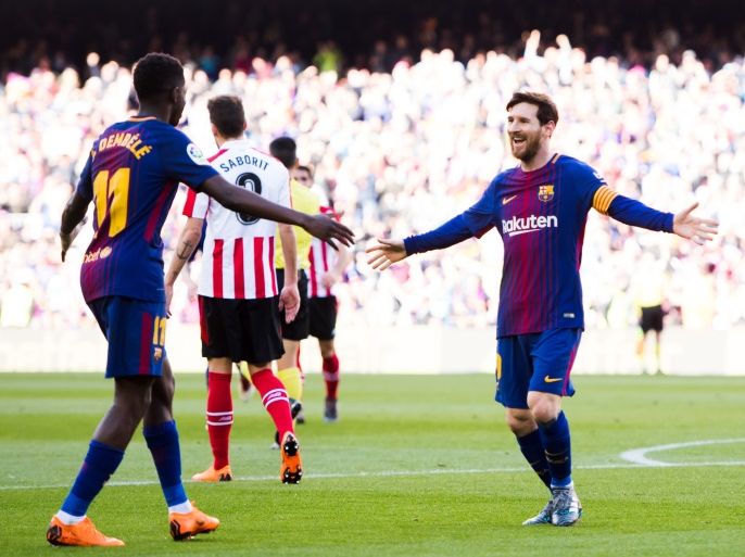 BARCELONA, SPAIN - MARCH 18: Lionel Messi of FC Barcelona celebrates with his teammate Ousmane Dembele after scoring his team's second goal during the La Liga match between Barcelona and Athletic Club at Camp Nou on March 18, 2018 in Barcelona, Spain. (Photo by Alex Caparros/Getty Images)
