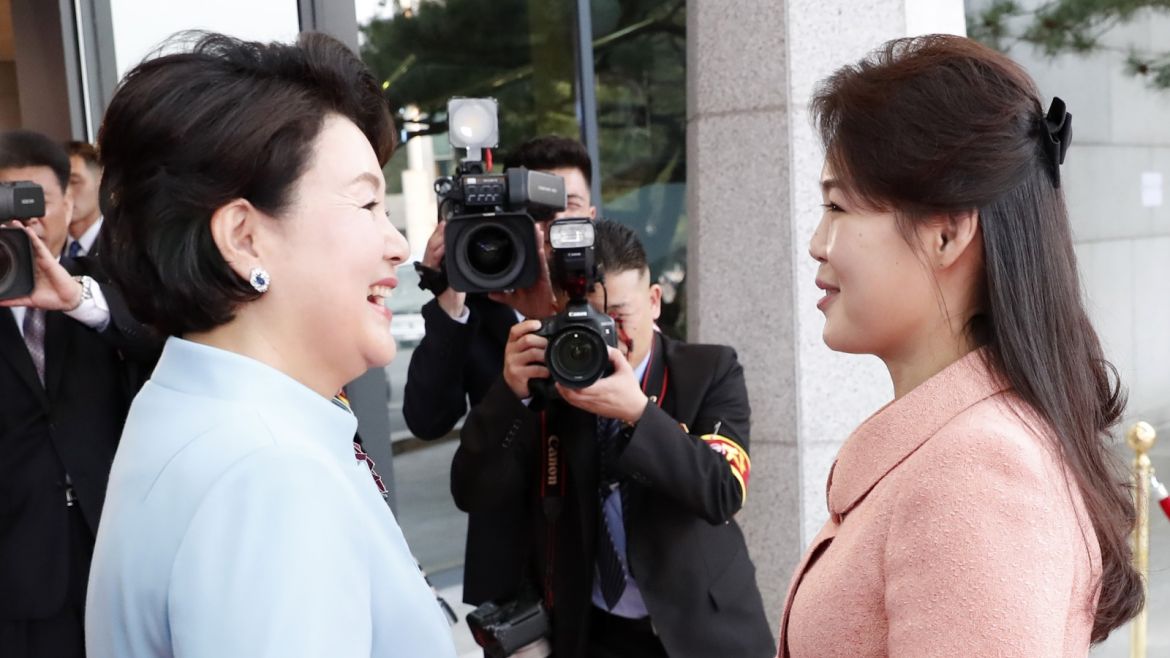 PANMUNJOM, SOUTH KOREA - APRIL 27:  South Korea's first lady Kim Jung-sook (L) shakes hands with North Korean first lady Ri Sol-ju (R) upon arrival at the Peace House on April 27, 2018 in Panmunjom, South Korea. Kim and Moon meet at the border today for the third-ever inter-Korean summit talks after the 1945 division of the peninsula, and first since 2007 between then President Roh Moo-hyun of South Korea and Leader Kim Jong-il of North Korea. (Photo by Korea Summit Press Pool/Getty Images)