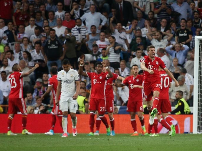 Football Soccer - Real Madrid v Bayern Munich - UEFA Champions League Quarter Final Second Leg - Estadio Santiago Bernabeu, Madrid, Spain - 18/4/17 Bayern Munich's Thomas Muller celebrates after Real Madrid's Sergio Ramos scores an own goal and the second goal for Bayern Munich Reuters / Sergio Perez Livepic