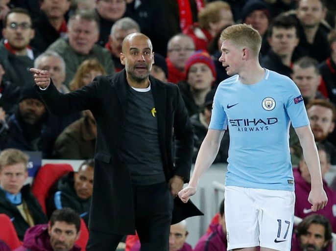 Soccer Football - Champions League Quarter Final First Leg - Liverpool vs Manchester City - Anfield, Liverpool, Britain - April 4, 2018 Manchester City manager Pep Guardiola gives instructions to Kevin De Bruyne REUTERS/Andrew Yates