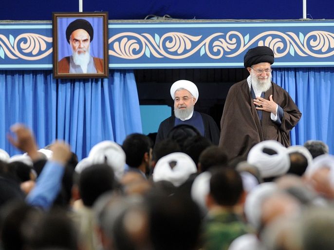 Iranian Supreme Leader Ayatollah Ali Khamenei (R) and Iranian President Hassan Rouhani (L) arriving during a ceremony in Tehran, Iran, 14 April 2018.