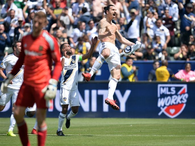 March 31, 2018; Carson, CA, USA; Los Angeles Galaxy forward Zlatan Ibrahimovic (9) celebrates his goal scored against Los Angeles FC during the second half at StubHub Center. Mandatory Credit: Gary A. Vasquez-USA TODAY Sports