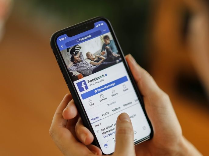 epa06672814 A smart phone is seen displaying the Facebook social media app in Brisbane, Queensland, Australia, 14 April 2018.