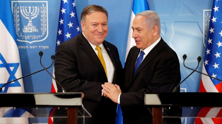 Israeli Prime Minister Benjamin Netanyahu shakes hands with U.S. Secretary of State Mike Pompeo during a meeting at the Ministry of Defence in Tel Aviv, Israel, April 29, 2018. Thomas Coex/Pool via Reuters
