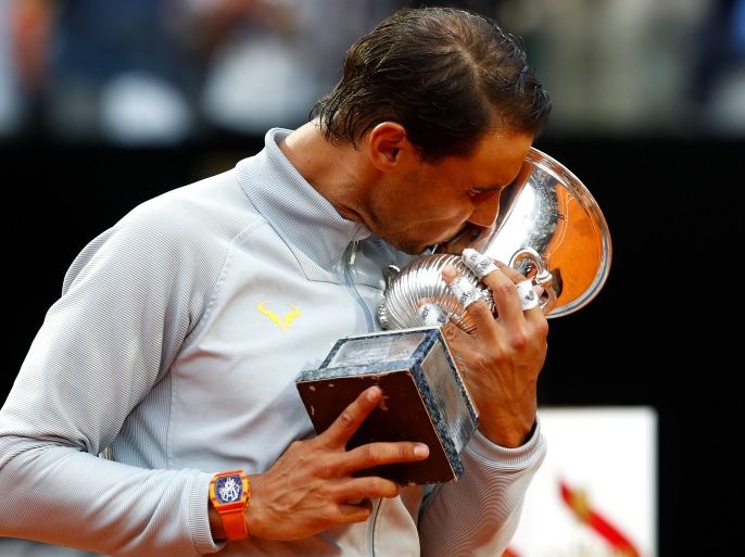 ROME, ITALY - MAY 20: Rafael Nadal of Spain kisses the trophy after his win over Alexander Zverev of Germany in the final during day eight of the Internazionali BNL d'Italia 2018 tennis at Foro Italico on May 20, 2018 in Rome, Italy. (Photo by Julian Finney/Getty Images)