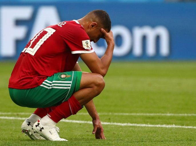 Soccer Football - World Cup - Group B - Morocco vs Iran - Saint Petersburg Stadium, Saint Petersburg, Russia - June 15, 2018 Morocco's Aziz Bouhaddouz looks dejected after the match REUTERS/Michael Dalder