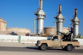 Libyan forces loyal to eastern commander Khalifa Haftar ride a pickup truck at the Zueitina oil terminal in Zueitina, west of Benghazi, Libya September 14, 2016. Picture taken September 14, 2016. REUTERS/Esam Omran Al-Fetori