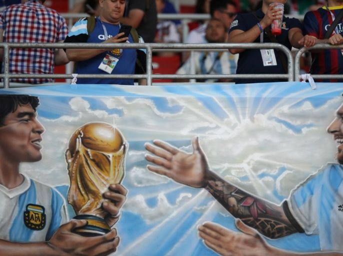 Soccer Football - World Cup - Group D - Argentina vs Iceland - Spartak Stadium, Moscow, Russia - June 16, 2018 Fans display a banner of Argentina's Lionel Messi and Diego Maradona before the match REUTERS/Carl Recine