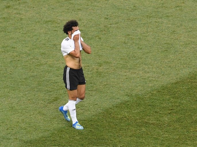 VOLGOGRAD, RUSSIA - JUNE 25: Mohamed Salah of Egypt walks off dejected following the 2018 FIFA World Cup Russia group A match between Saudia Arabia and Egypt at Volgograd Arena on June 25, 2018 in Volgograd, Russia. (Photo by Laurence Griffiths/Getty Images)
