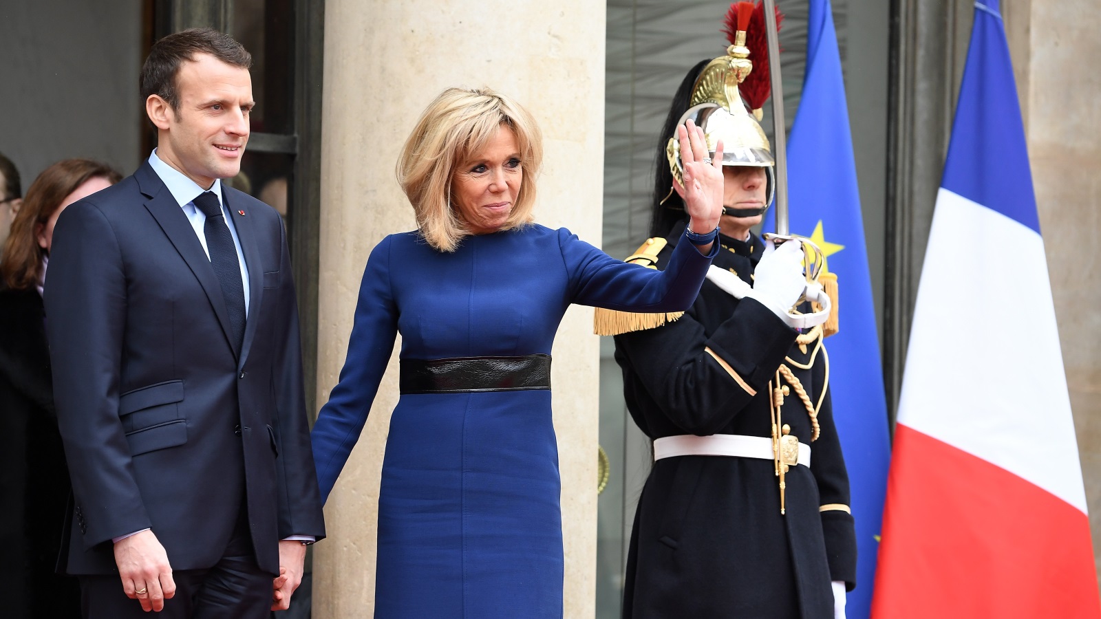 الرئيس الفرنسي ماركون وزوجته (غيتي)