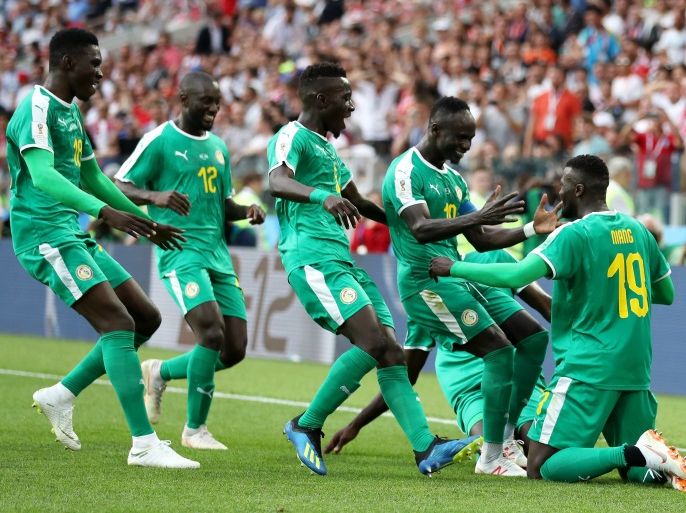 MOSCOW, RUSSIA - JUNE 19: Mbaye Niang of Senegal celebrates with teammates after scoring his team's second goal during the 2018 FIFA World Cup Russia group H match between Poland and Senegal at Spartak Stadium on June 19, 2018 in Moscow, Russia. (Photo by Catherine Ivill/Getty Images)