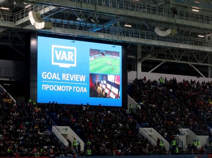 Soccer Football - World Cup - Group B - Spain vs Morocco - Kaliningrad Stadium, Kaliningrad, Russia - June 25, 2018 General view of the scoreboard during a VAR review after Spain's Iago Aspas scored their second goal which was initially ruled offside REUTERS/Mariana Bazo TPX IMAGES OF THE DAY