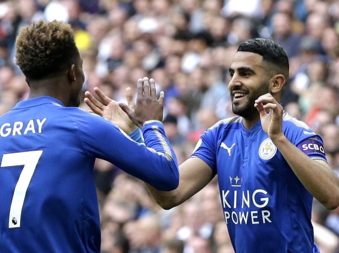 LONDON, ENGLAND - MAY 13: Riyad Mahrez of Leicester City celebrates scoring his sides second goal with team mate Demarai Gray of Leicester City during the Premier League match between Tottenham Hotspur and Leicester City at Wembley Stadium on May 13, 2018 in London, England. (Photo by Henry Browne/Getty Images)