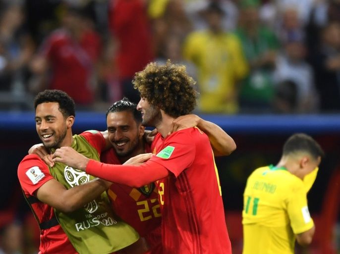 KAZAN, RUSSIA - JULY 06: Mossua Dembele, Nacer Chadli, and Marouane Fellaini of Belgium celebrate following their sides victory in the 2018 FIFA World Cup Russia Quarter Final match between Brazil and Belgium at Kazan Arena on July 6, 2018 in Kazan, Russia. (Photo by Shaun Botterill/Getty Images)
