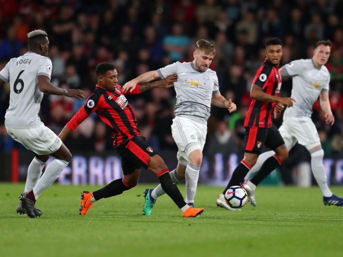 BOURNEMOUTH, ENGLAND - APRIL 18: Jordon Ibe of AFC Bournemouth tackles Luke Shaw of Manchester United during the Premier League match between AFC Bournemouth and Manchester United at Vitality Stadium on April 18, 2018 in Bournemouth, England. (Photo by Catherine Ivill/Getty Images)