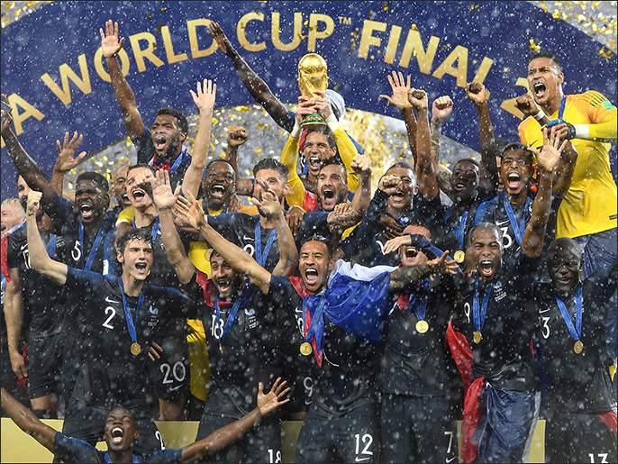 epa06891484 French player react with the trophy after winning the FIFA World Cup 2018 final between France and Croatia in Moscow, Russia, 15 July 2018. (RESTRICTIONS APPLY: Editorial Use Only, not used in association with any commercial entity - Images must not be used in any form of alert service or push service of any kind including via mobile alert services, downloads to mobile devices or MMS messaging - Images must appear as still images and must not emulate match action video footage - No alteration is made to, and no text or image is superimposed over, any published image which: (a) intentionally obscures or removes a sponsor identification image; or (b) adds or overlays the commercial identification of any third party which is not officially associated with the FIFA World Cup) EPA-EFE/FACUNDO ARRIZABALAGA EDITORIAL USE ONLY