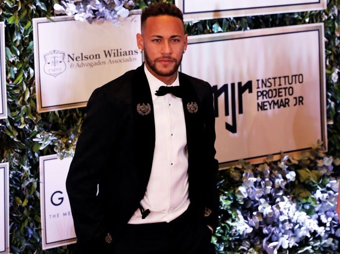 Soccer player Neymar poses on the red carpet during an auction to raise funds for his Institute Project Neymar Jr in Sao Paulo, Brazil July 19, 2018. REUTERS/Nacho Doce