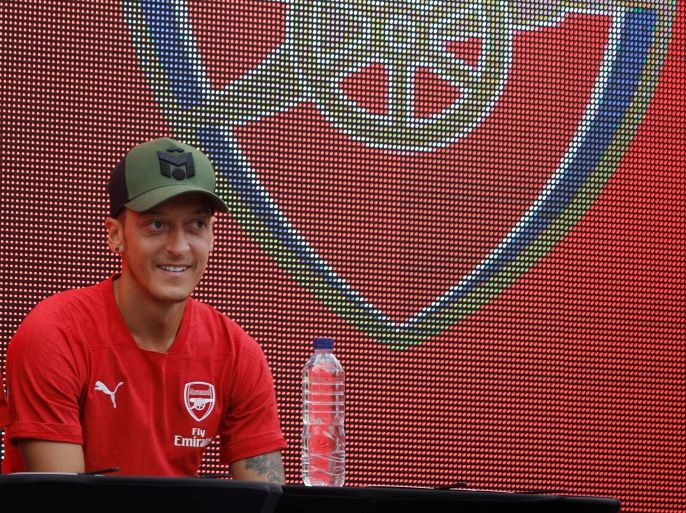 Arsenal's Mesut Ozil of Germany attends a meet and greet session with fans in Singapore July 25, 2018. REUTERS/Edgar Su