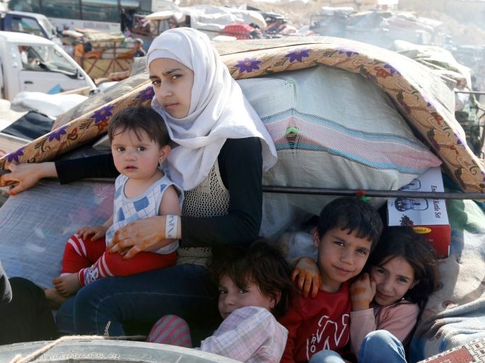 Syrian refugees prepare to return to Syria from the Lebanese border town of Arsal, Lebanon June 28, 2018. REUTERS/Mohamed Azakir