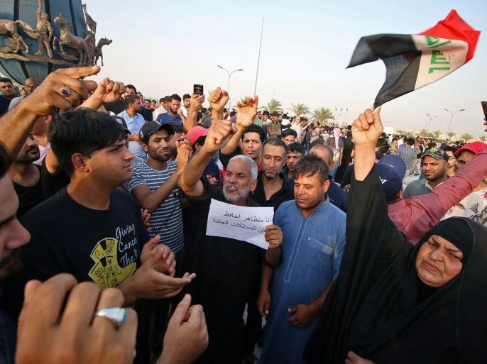 People shout slogans during a protest in Basra, Iraq July 19, 2018. REUTERS/Essam al-Sudani